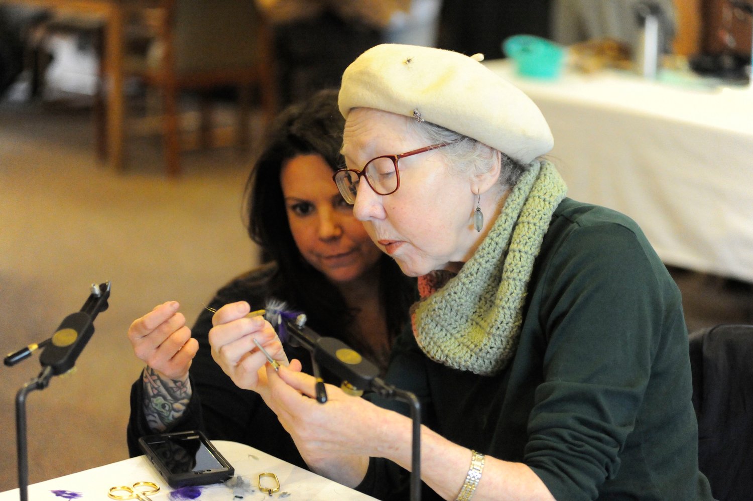 First-time tier. Diane Amses of Gould, NY learned how to tie her first-ever Woolly Bugger from instructor Nicole March.